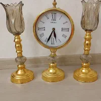 ساعت و شمعدانی