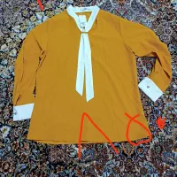 تعدادی لباس نو از مغازه مونده