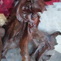 مجسمه  مولانا و شخص عصا به دست چوبی