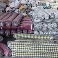 فروشنده و خریدار پارچه طاقه ته طاقه