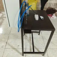 دستگاه پرکن دستمال کاغذی پنوماتیک کوچک
