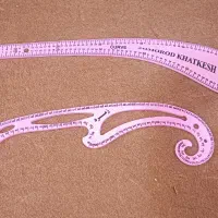 خط کش و کتاب خیاطی