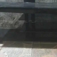 فروش زیرتلویزیونی شیشه ای سالم