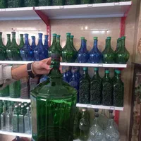 بطری شیشه ای ۸لیتری|ظروف نگهدارنده، پلاستیکی، یک‌بارمصرف|اصفهان, باغ فدک|دیوار