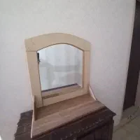 آینه  و  ساعت دیواری