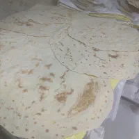 نیازمند وابر،کف زن ،پهن کن نان محلی