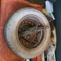فروش چرخ زاپاس با جک و آچار پراید