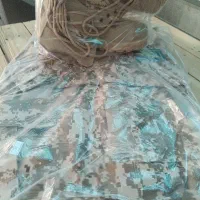 یک دست لباس همراه با پوتین