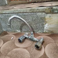 شیر آب برنجی و کابینت