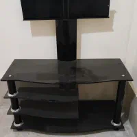 میز تلویزیون شیشه ای همراه پایه دیواری