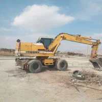 بیل مکانیکی چرخ لاستیکی