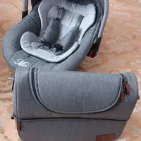 یک عدد کریر به همراه ساک