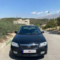 مزدا 323 اتومات مشکی متالیک تیپ 5