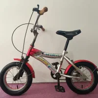 دوچرخه ۱۲ نقره ای قرمز