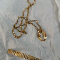 زنجیر با پلاک ویه دونه نصفه النگو