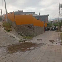 معاوضه ملک تجاری در بانه با ماشین سنگین و کشنده