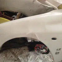 دوتا گلگیر چپ و راست ۲۰۶ و چراغ جلو پارس