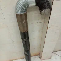 لوله بخاری و دوتا زانو