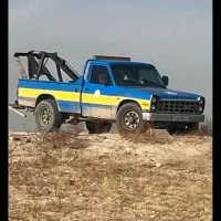 یدک کش  نیسان جرثقیل خودرو بر امداد خورو چرخگیر