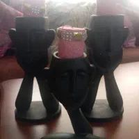 سه عدد جا شمعی از جنس سنگ به همراه سه عدد شمع