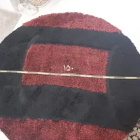 فرش رنگ زمینه قرمز مشکی