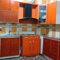 کابینت آشپزخانه شیک و جادار نارنجی