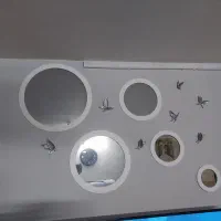 آیینه گرد دیواری با پروانه