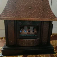 بخاری گازی طرح شومینه