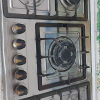 دوتا اجاق گاز یکی صفحه ای یکی فر