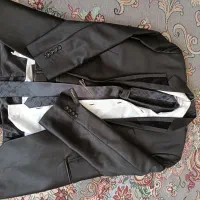 کت شلوار|لباس|قم, وادی السلام|دیوار