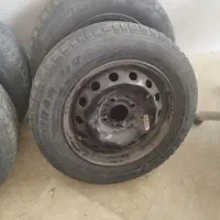 ۴ عدد لاستیک و رینگ فابریک با قالپاق