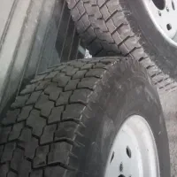 یک جفت لاستیک گل عقب نیسان ۹۰ درصد با رینگ ترک|قطعات یدکی و لوازم جانبی|بافت, |دیوار