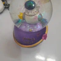 گوی شیشه‌ای فضانورد