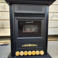 بخاری ( مدل طاووس طلایی ) رویه فلزی سیاه|بخاری، هیتر، شومینه|تبریز, |دیوار