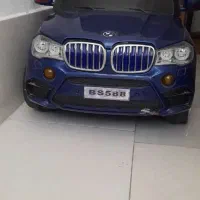 ماشین شارژی بی ام و  دو نفره وزن تا ۳۰ کیلو صحنه