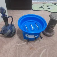 چراغ نفتی و سه فیتیله و یک عدد تنگ نوشیدنی