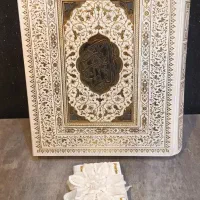 قرآن نو بخط عثمان طه طلاکوب و جلد برجسته آیینه ای