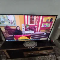 فروش تلویزیون مجیک به همراه میز تلویزیون