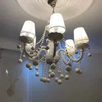 یک جفت لوستر و دیوار کوب