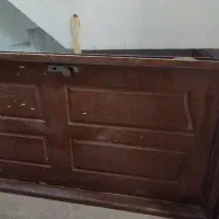 درب آپارتمان همراه با چارچوب فلزی
