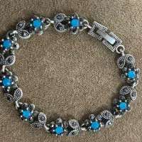 دستبند نگین آبی استیل