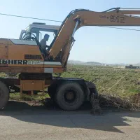 بیل مکانیکی لاستیکی 912