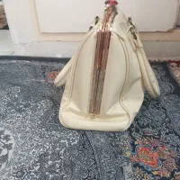 کیف مجلسی|کیف، کفش، کمربند|رباط‌کریم, رباط‌کریم|دیوار