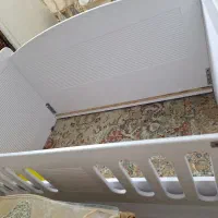 تخت کنار مادر کودک