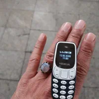 مینی گوشی(اندازه ریموت خودرو)