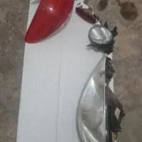 ۲چراغ جلو و ۲پرژکتور  و چراغ خطر پژو 206