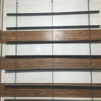 دکور مغازه و صندلی راحتی مشتری و استند