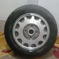 رینگ اسپرت و لاستیک پهن خارجی در حد نو