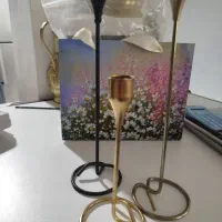 تعدادی جاشمعی چوبی و فلزی وجای دستمالی به فروشی