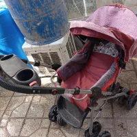 میزتلوزیون و یه کالسکه